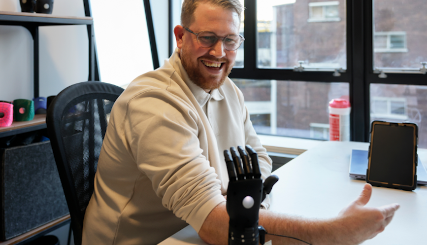 Image of Louis trialling a bionic arm
